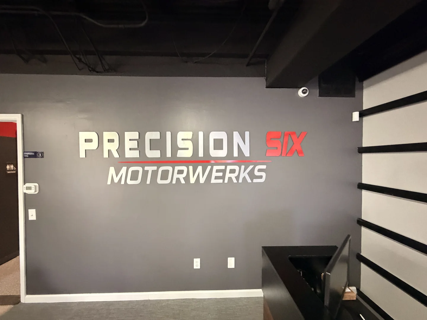 Precision Six Motorwerks: Interior wall signage